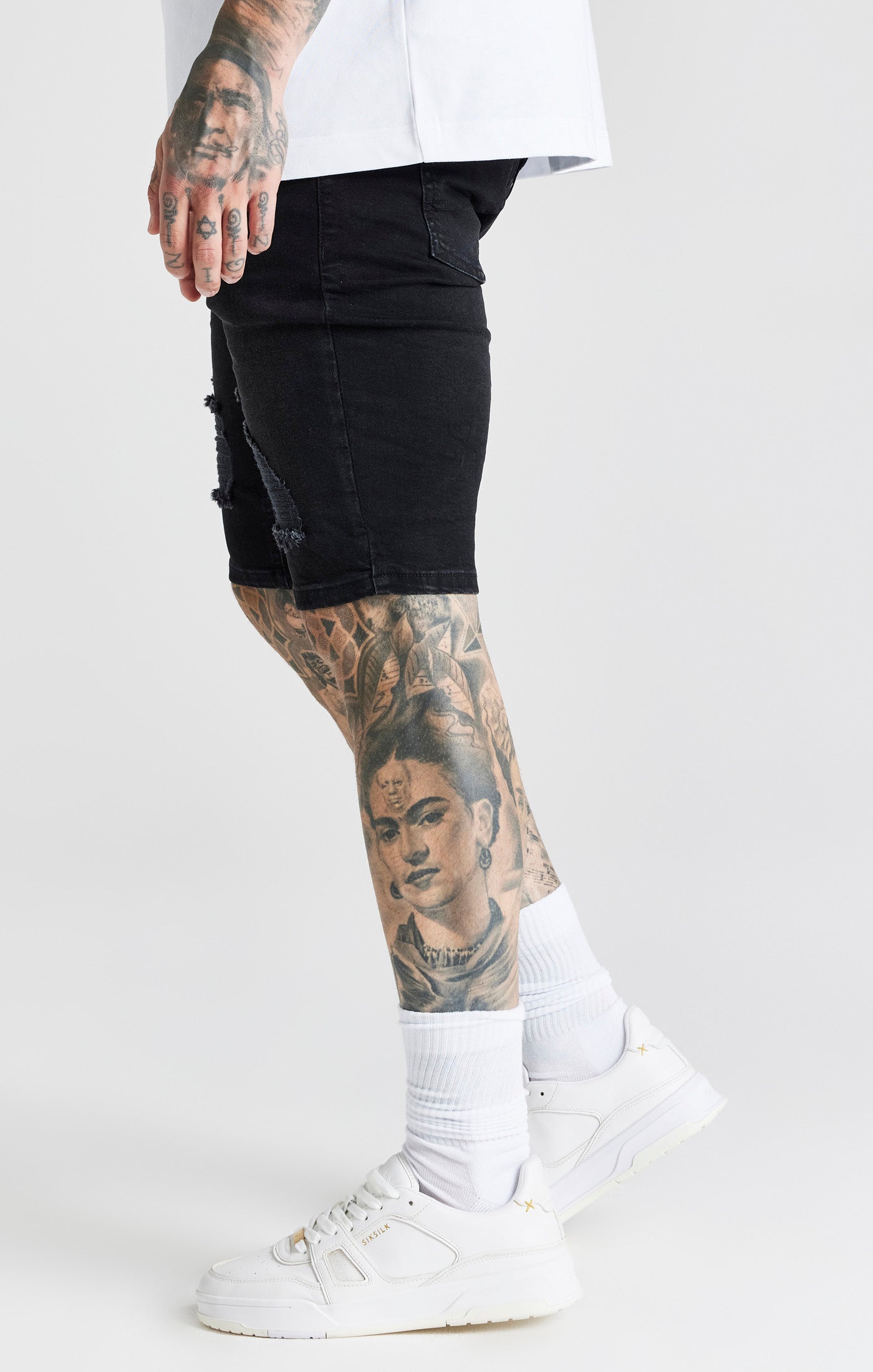 Schwarze Distressed Denim-Shorts (1)