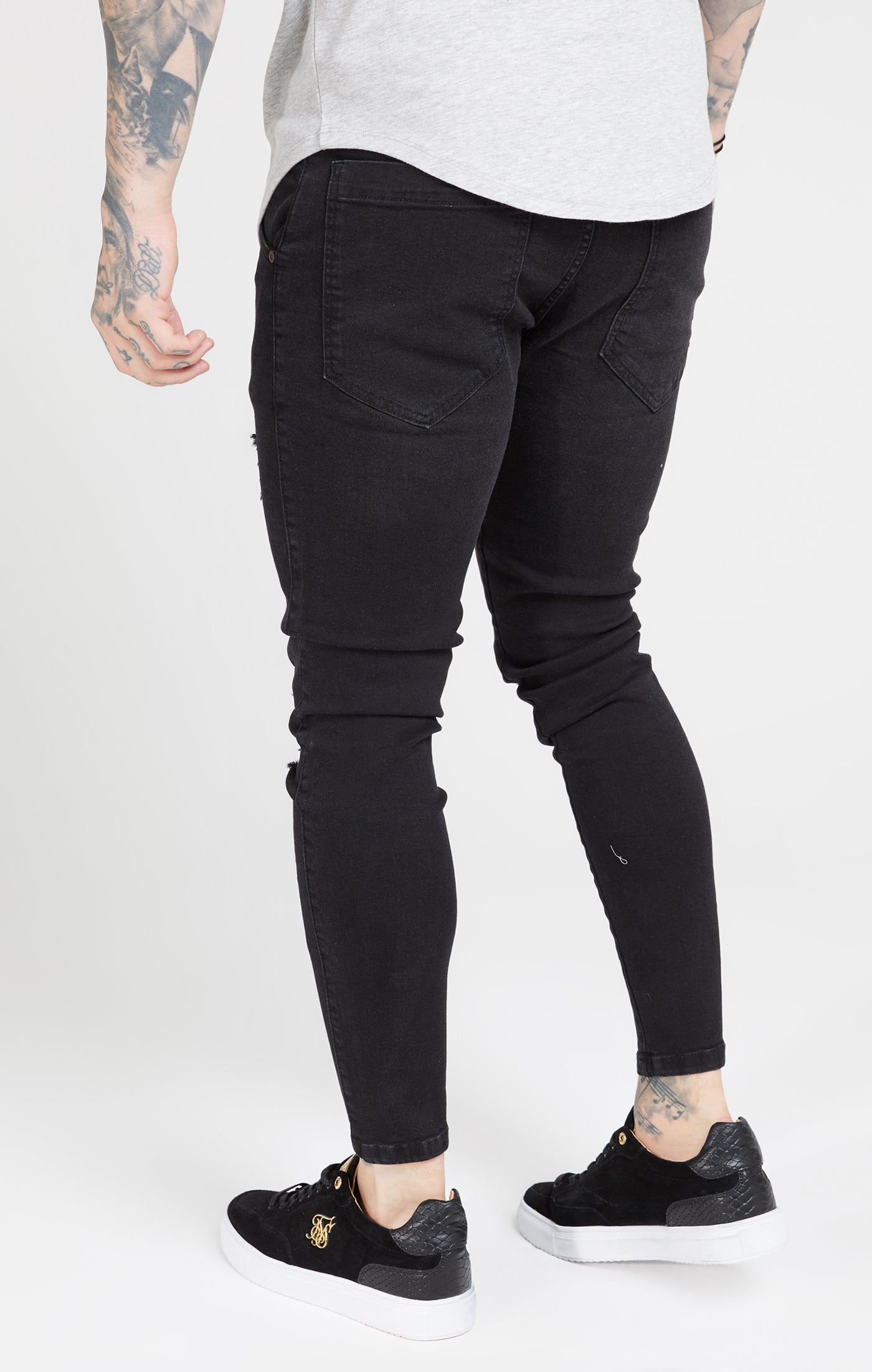 Schwarze Skinny Jeans in Distressed Optik (3)