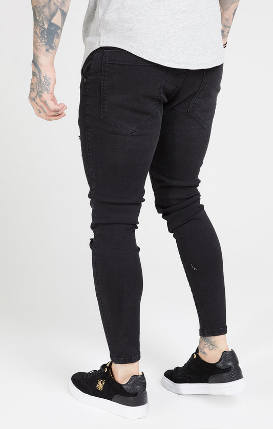 Schwarze Skinny Jeans in Distressed Optik
