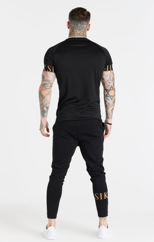 Schwarz-goldenes T-Shirt mit elastischen Ärmelabschlüssen