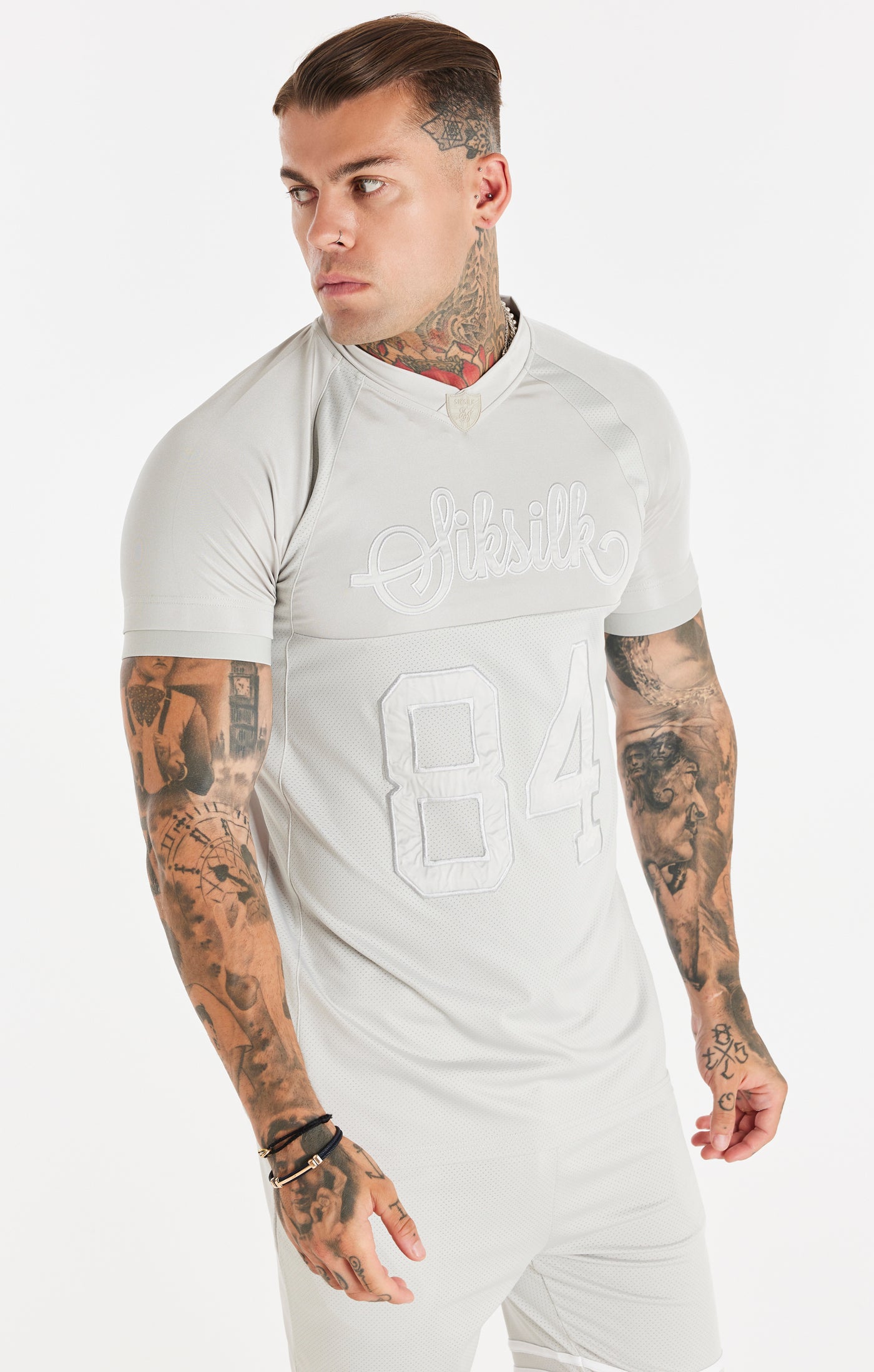 SikSilk Sport-T-Shirt aus Stretch – Grau