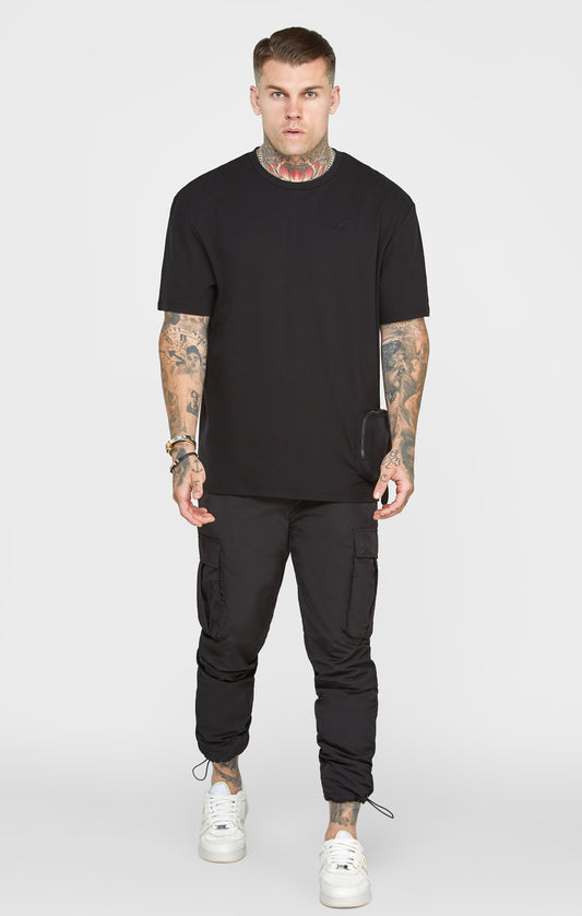 Schwarzes Taschen T-Shirt in Oversized Passform