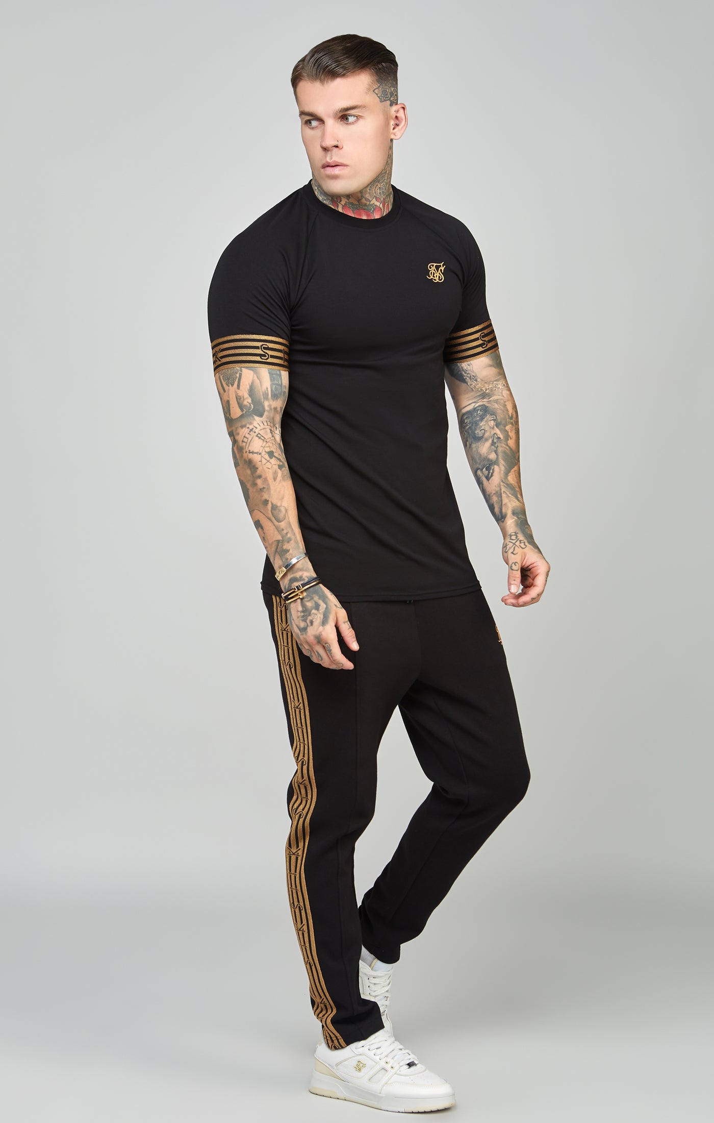 Schwarz-goldenes Strick-T-Shirt mit elastischen Bündchen (2)